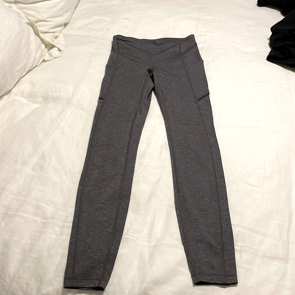 Lulu lemon leggings!!! Size 4 with tag still in!!! Grey, never worn.